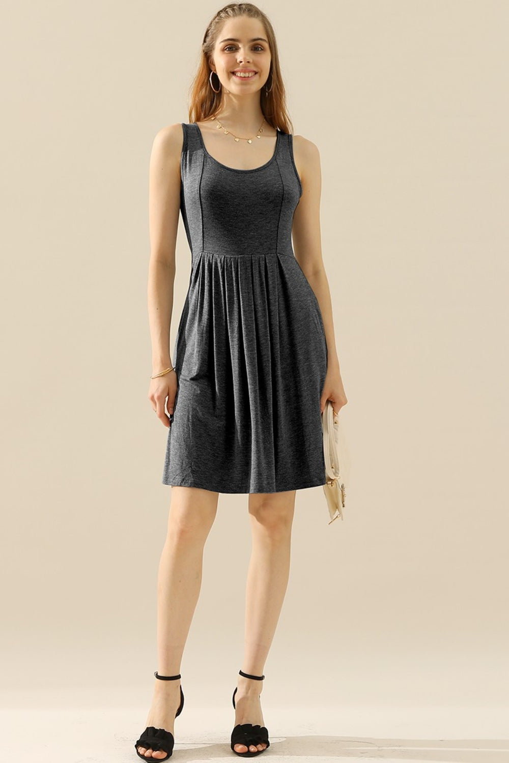 
                  
                    Round Neck Ruched Sleeveless Dress with Pockets
                  
                