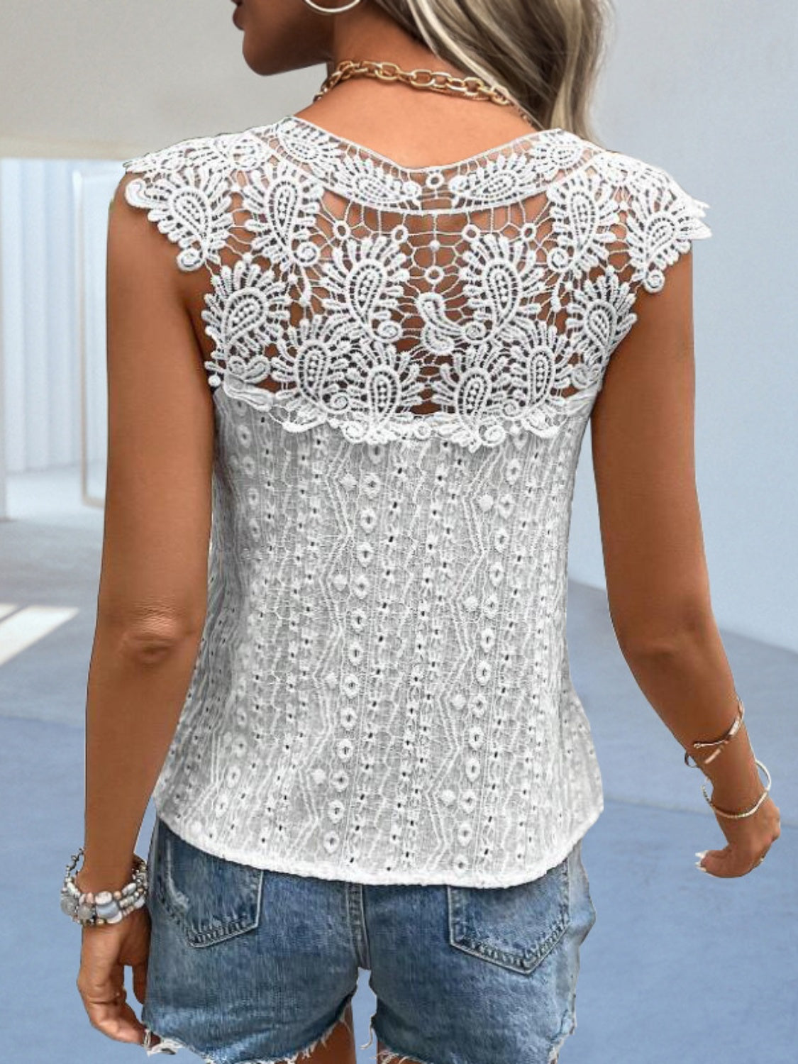 
                  
                    Cutout Lace Detail Notched Blouse
                  
                