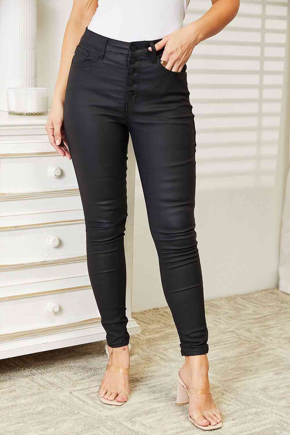 
                  
                    High Rise Black Coated Skinny Jeans
                  
                