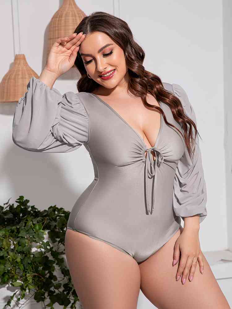 
                  
                    Tied Deep V Balloon Sleeve One-Piece Swimsuit
                  
                