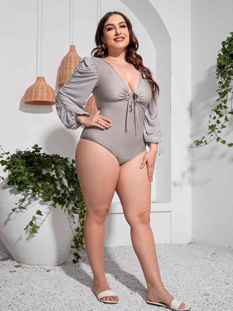 
                  
                    Tied Deep V Balloon Sleeve One-Piece Swimsuit
                  
                