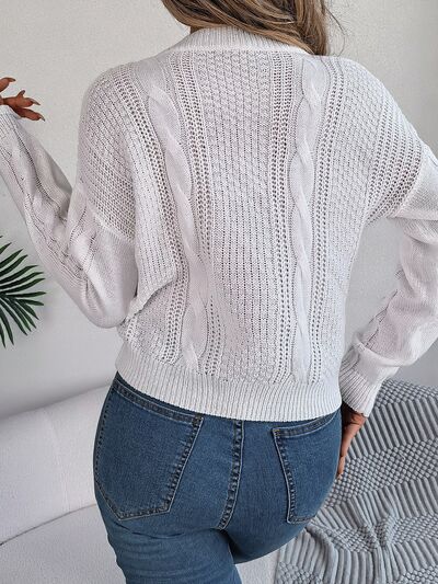 
                  
                    Cable-Knit Buttoned Round Neck Sweater
                  
                