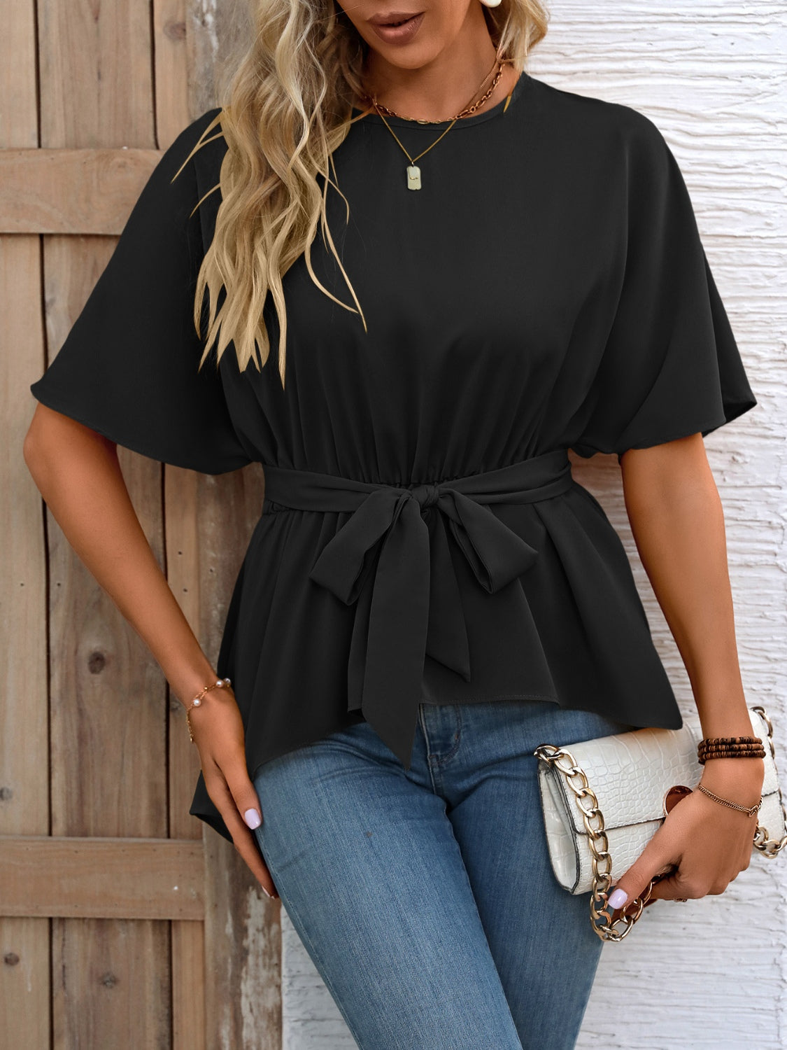 
                  
                    Tied Round Neck Half Sleeve Blouse
                  
                