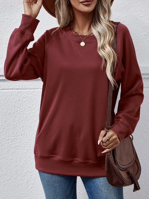 
                  
                    Round Neck Long Sleeve Sweatshirt
                  
                