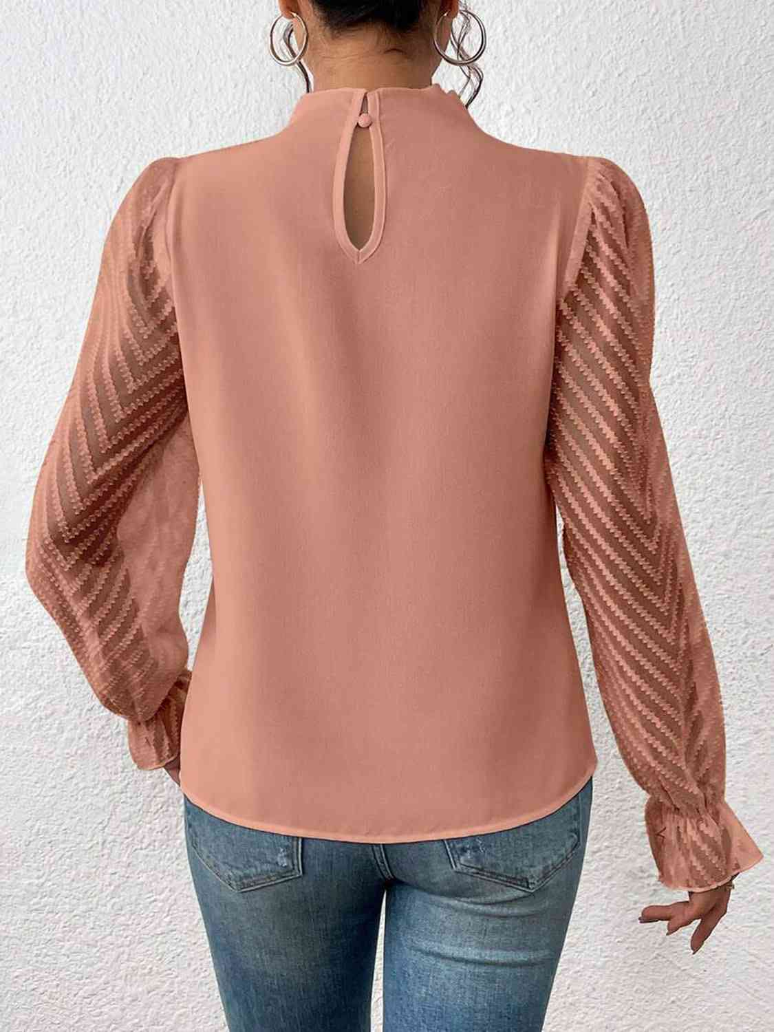 
                  
                    Mock Neck Flounce Sleeve Blouse
                  
                