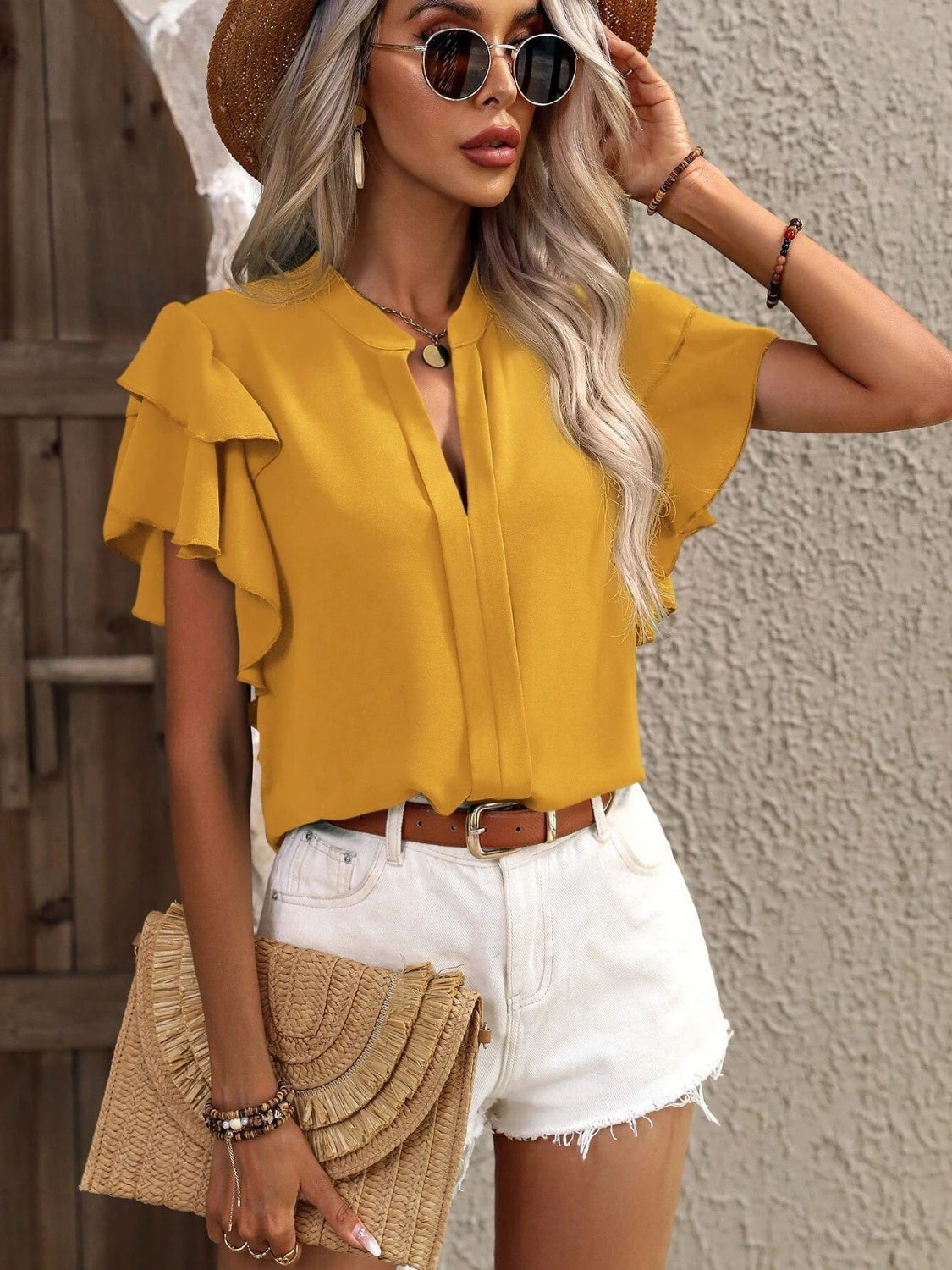 
                  
                    Ruffled Notched Short Sleeve Blouse
                  
                