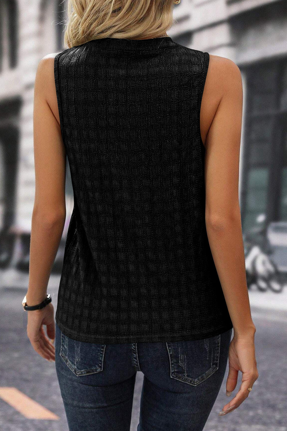 
                  
                    Solid Notched Sleeveless Blouse
                  
                