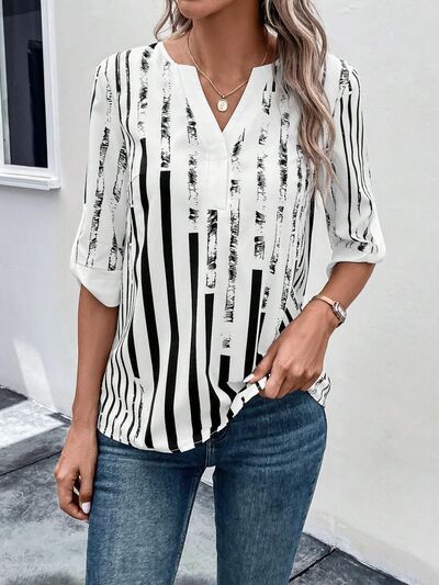 
                  
                    Striped Notched Half Sleeve Blouse
                  
                