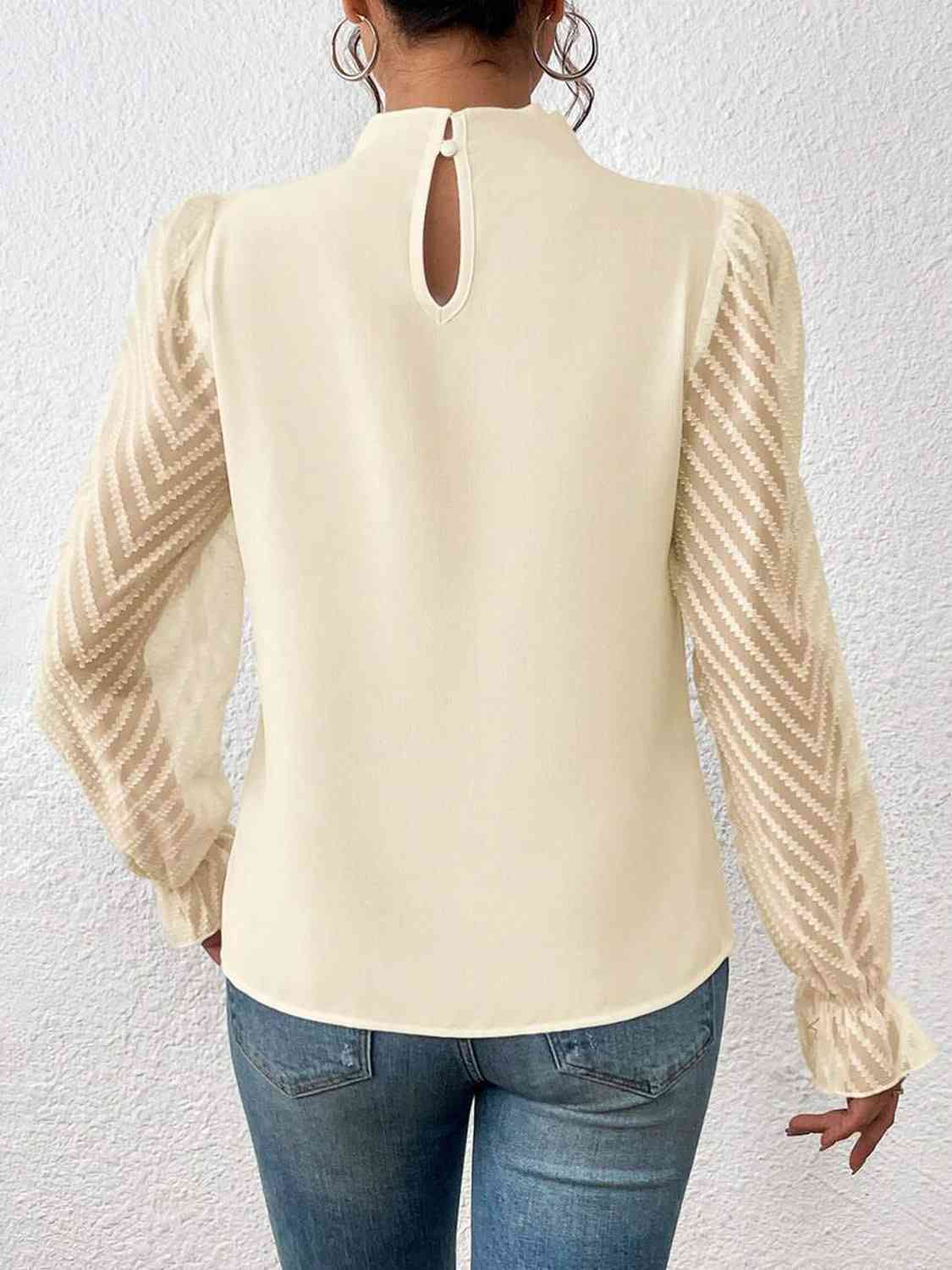 
                  
                    Mock Neck Flounce Sleeve Blouse
                  
                