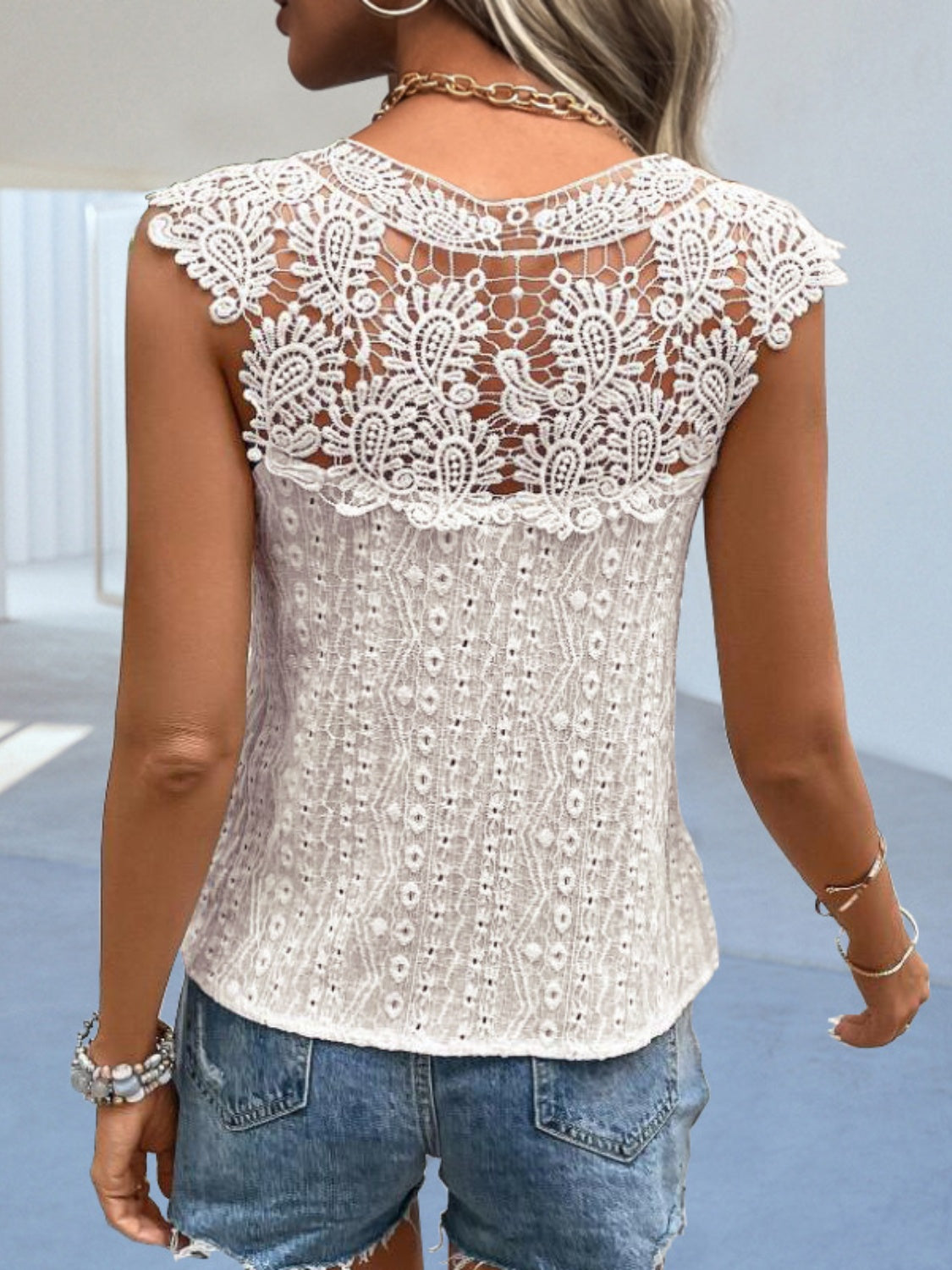 
                  
                    Cutout Lace Detail Notched Blouse
                  
                