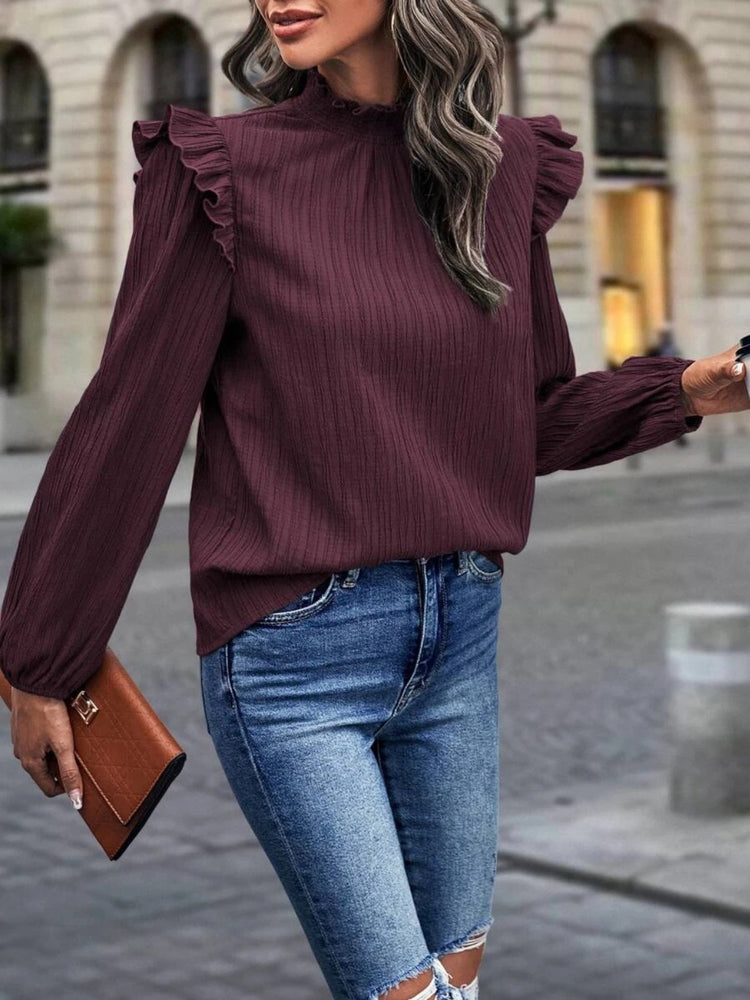 
                  
                    Mock Neck Ruffle Shoulder Blouse
                  
                