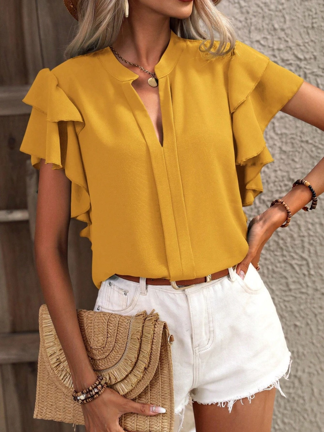 
                  
                    Ruffled Notched Short Sleeve Blouse
                  
                