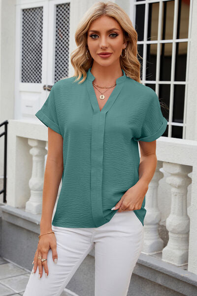 
                  
                    Notched Short Sleeve Blouse
                  
                