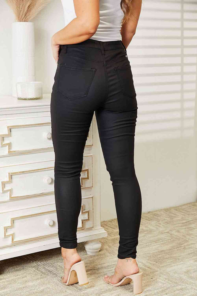 
                  
                    High Rise Black Coated Skinny Jeans
                  
                