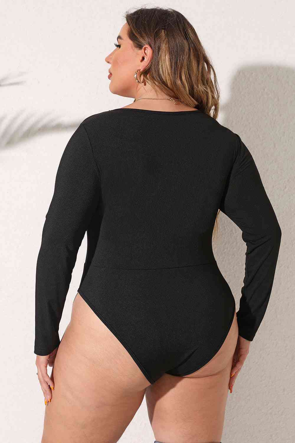 
                  
                    Round Neck Long Sleeve Bodysuit
                  
                