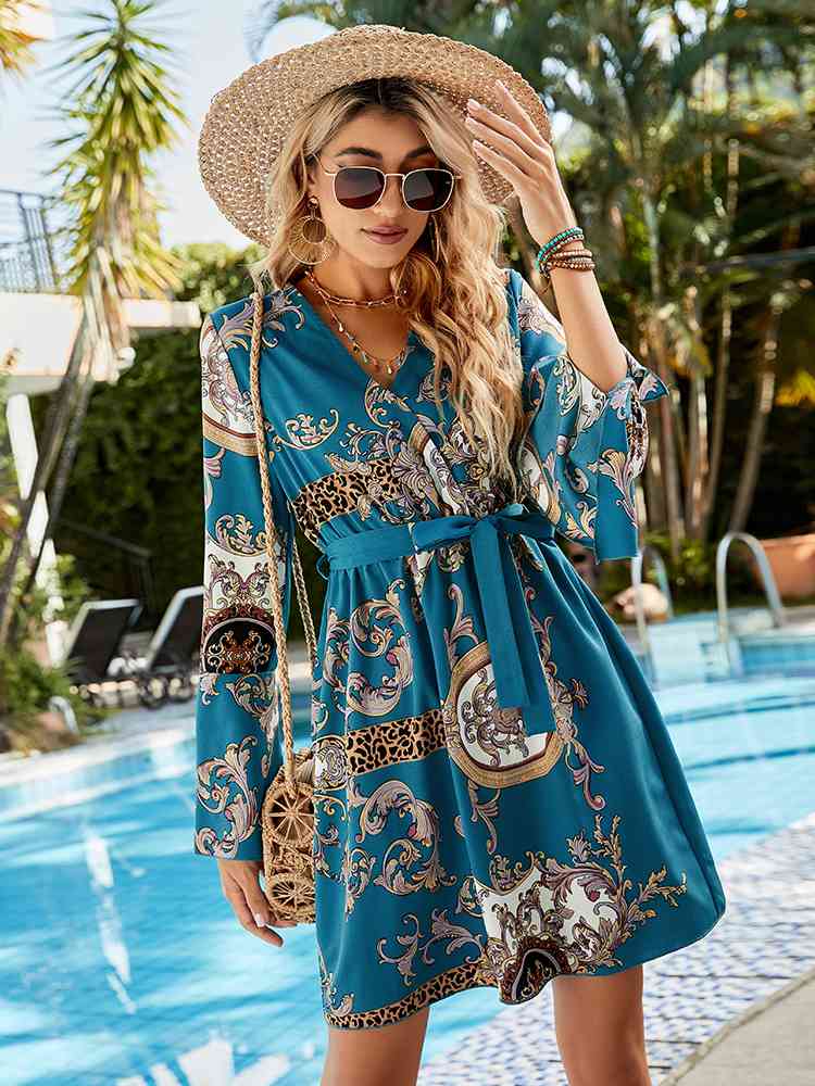 
                  
                    Printed Tie Belt Slit Flare Sleeve Dress
                  
                