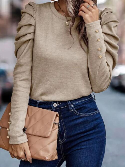 
                  
                    Round Neck Puff Sleeve Sleeve Blouse
                  
                