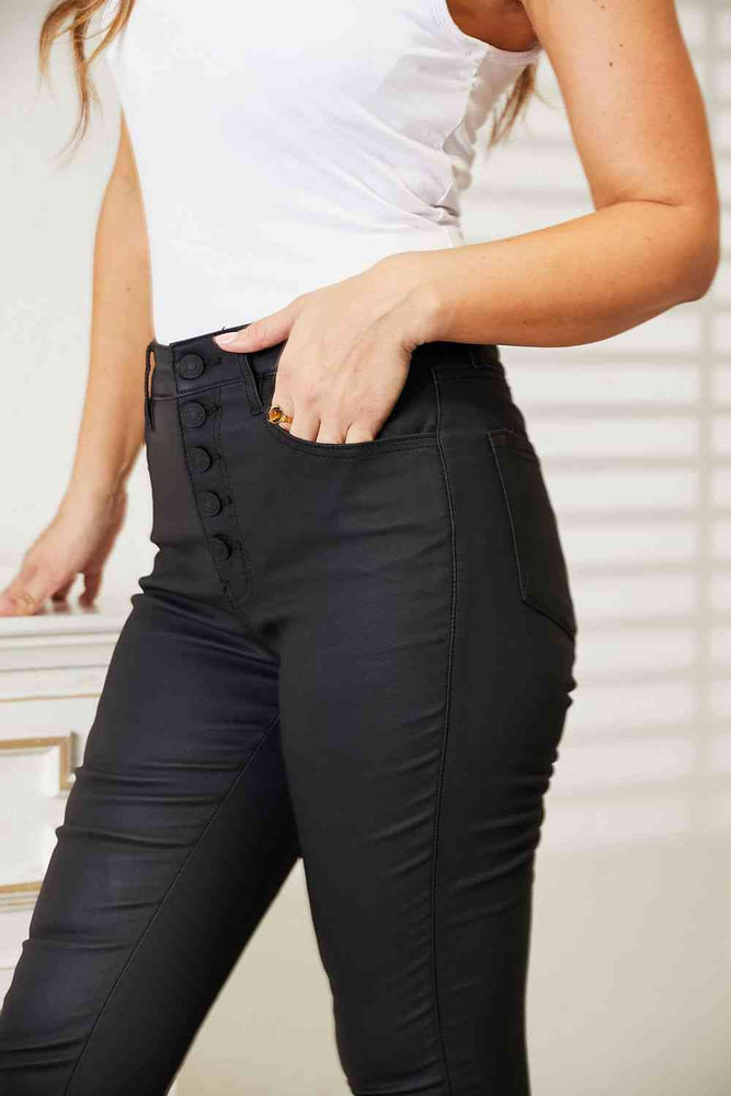 
                  
                    High Rise Black Coated Skinny Jeans
                  
                