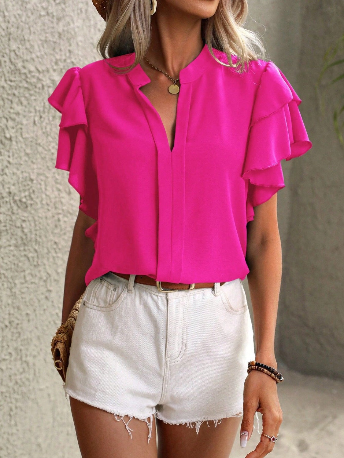 
                  
                    Ruffled Notched Short Sleeve Blouse
                  
                